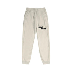 Beige Bronx Native sweatpants with bold black logo, drawstring waist, and ribbed cuffs for streetwear style.