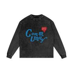 Black long-sleeve sweatshirt with blue text 'Community' and red heart graphic with 'BX' on chest