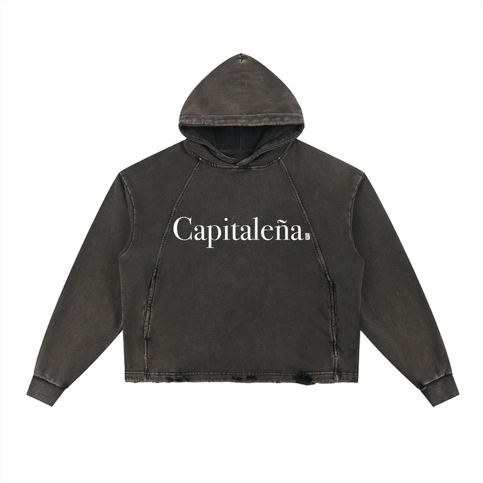 Dark cropped hoodie with 'Capitaleña' text, urban streetwear style for bold NYC-inspired fashion
