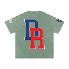 Green vintage tee with bold blue and red 'BR' graphic, Dominican Republic flag details on sleeves