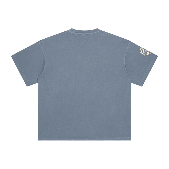 Blue streetwear tee with gold sleeve logo, inspired by NYC culture