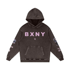 Dark washed hoodie with pink BXNY lettering, floral sleeve prints, and front pocket — urban streetwear style