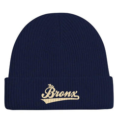 Navy blue ribbed beanie with gold 'The Bronx' script, NYC streetwear style winter hat