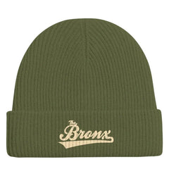 Olive green ribbed beanie with 'The Bronx' script embroidery, NYC streetwear style