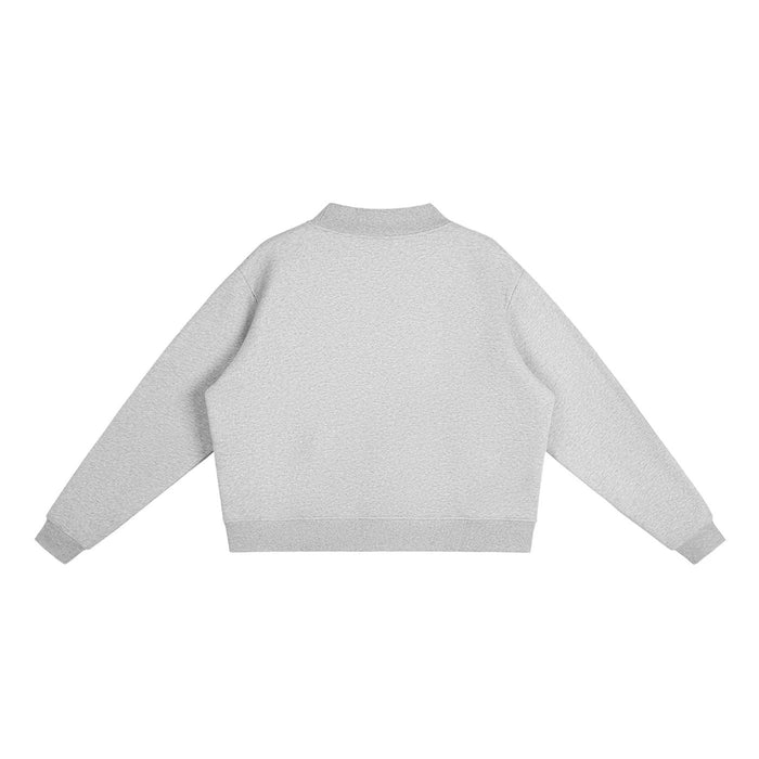 Light gray cropped sweatshirt with long sleeves, back view, streetwear style