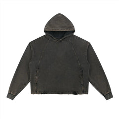 Dark washed cropped hoodie with raglan sleeves, distressed hem, and hood for streetwear style
